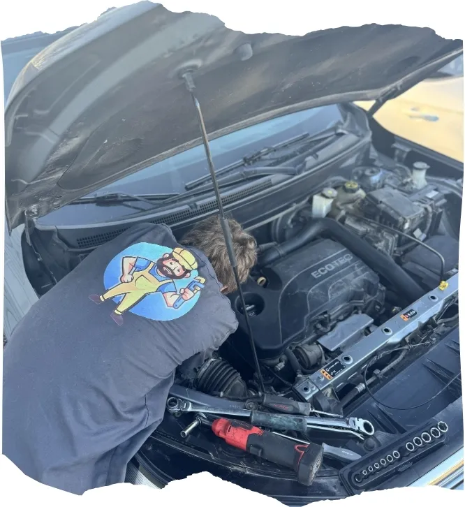 Image of Benny at Bennys auto repair working on a car.