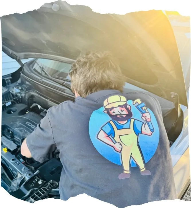 Benny at Bennys auto repair working on a customers car in Wichita Kansas